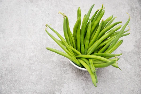 Verse Groene Bonen Een Getextureerde Achtergrond Lege Ruimte Voor Tekst — Stockfoto