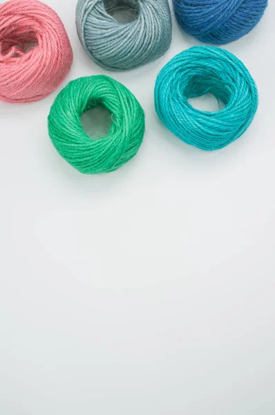 Vertical Shot Colored Cotton Threads White Background — Stock Photo, Image