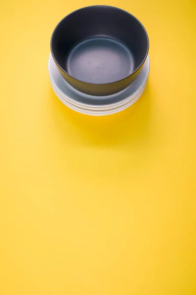 Top View Empty Ceramic Black White Plates Yellow Background — Stock Photo, Image