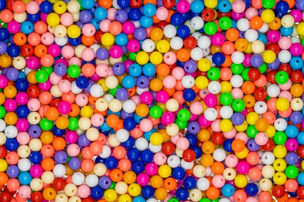 Muitas Bolas Plásticas Multicoloridas Formando Fundo Colorido — Fotografia de Stock