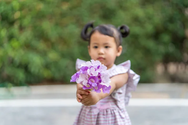 Adorable Asian Female Child Holding Purple White Flower Bouquet — Stock Photo, Image