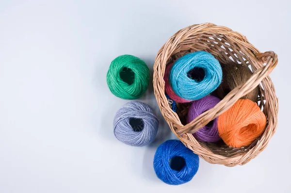 Closeup Shot Colored Cotton Threads Basket White Background — Stock Photo, Image