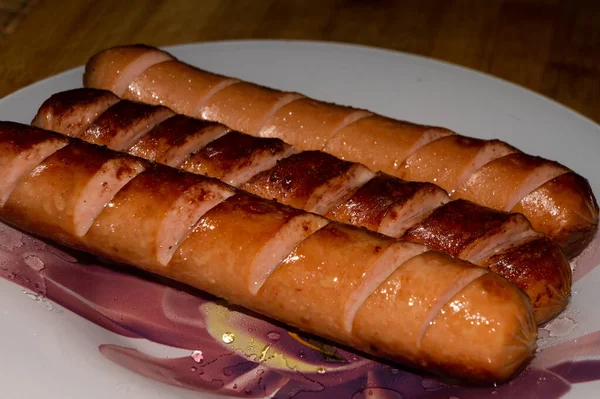 Fat man eating sausage Stock Photos, Royalty Free Fat man eating