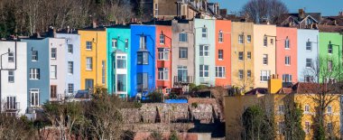 A panoramic shot of colorful houses of Clifton on a sunny day in Bristol, the UK clipart