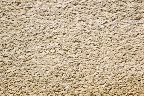 Zbliżenie Ujęcie Ciemnej Beżowej Teksturowanej Ściany — Zdjęcie stockowe