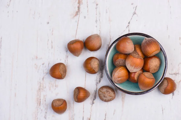 Haselnüsse Auf Strukturiertem Hintergrund Leerer Kopierraum Für Text Gesunde Ernährung — Stockfoto