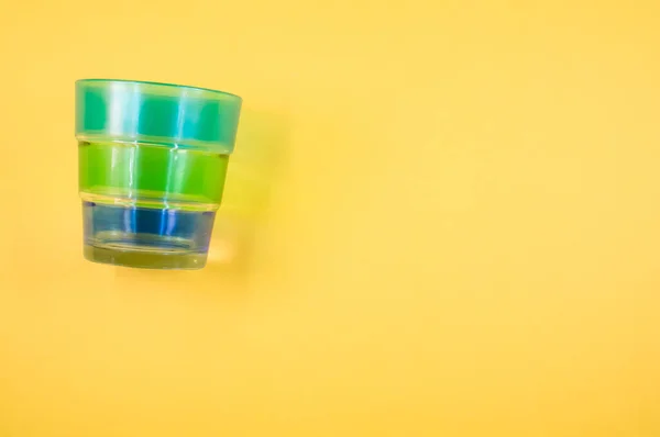 Top View Colored Glass Isolated Yellow Background — Stock Photo, Image