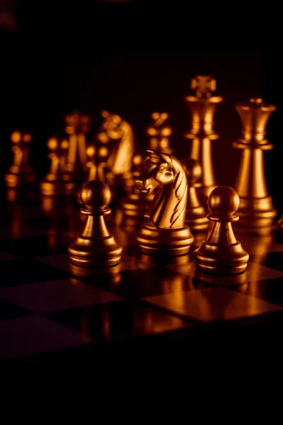 Vertical Closeup Shot Metal Chessmen Illuminated Bright Light — Stock Photo, Image