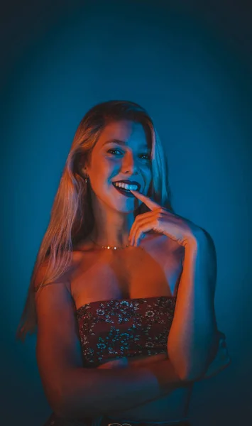 Seductive Young Spanish Female Wearing Sexy Top Posing Studio Blue — Stok fotoğraf