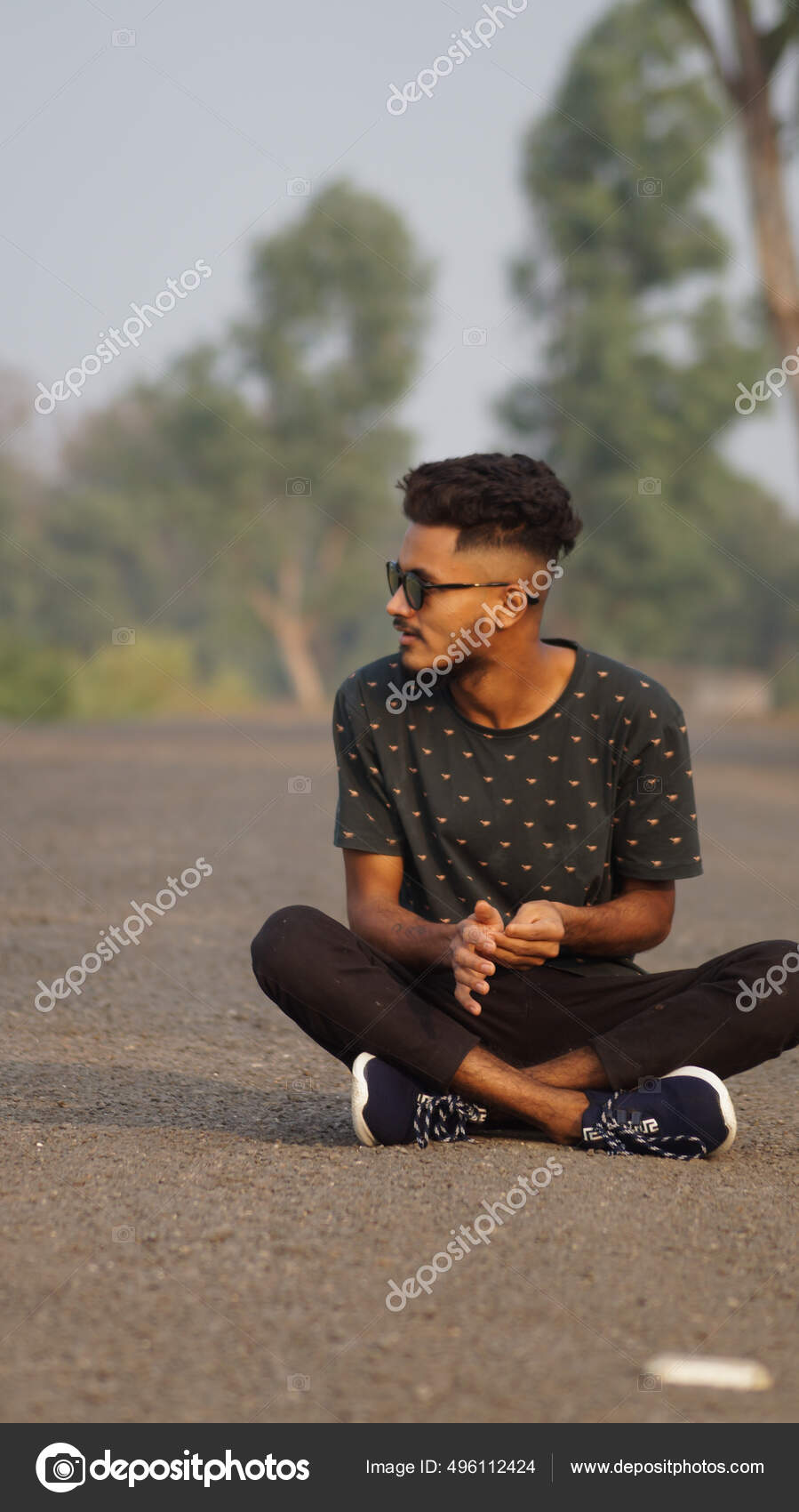 Profile of a Teenage Indian Boy Looking at outsides Stock Photo