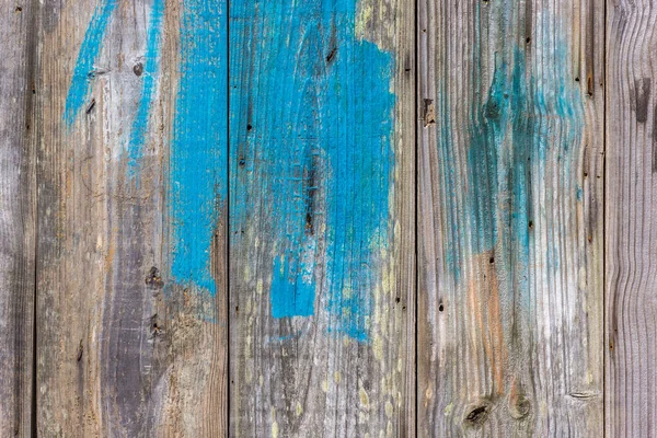 Tiro Close Uma Parede Madeira Com Tinta Azul Salpicada Sobre — Fotografia de Stock