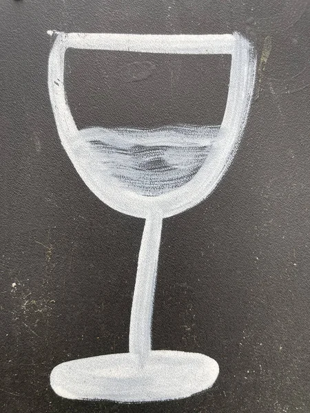 Plan Vertical Une Icône Verre Vin Blanc Sur Une Surface — Photo