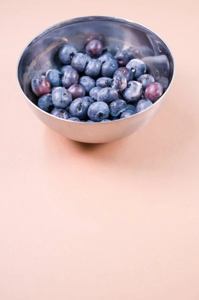 Vertical Closeup Small Bowl Blueberry Aesthetic Peach Background — Stock Photo, Image