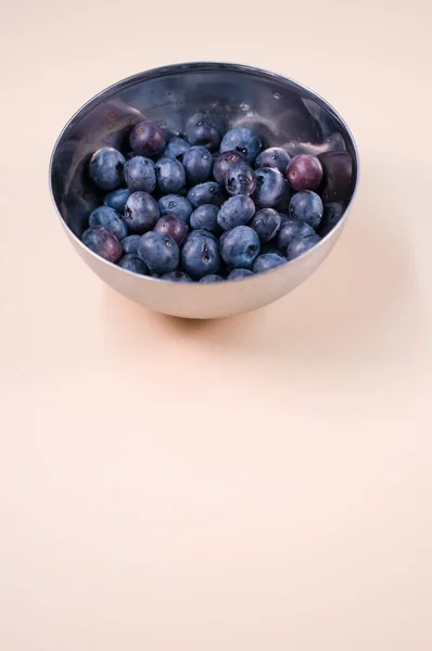 Vertical Closeup Small Bowl Blueberry Aesthetic Peach Background — Stock Photo, Image