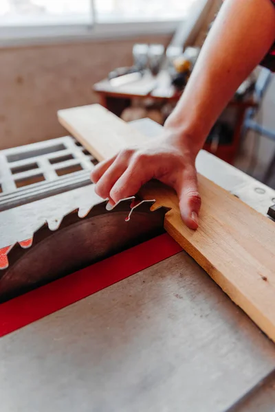 Caucasian Male Carpenter Cutting Wood Whilworking Workshop — Stock Photo, Image