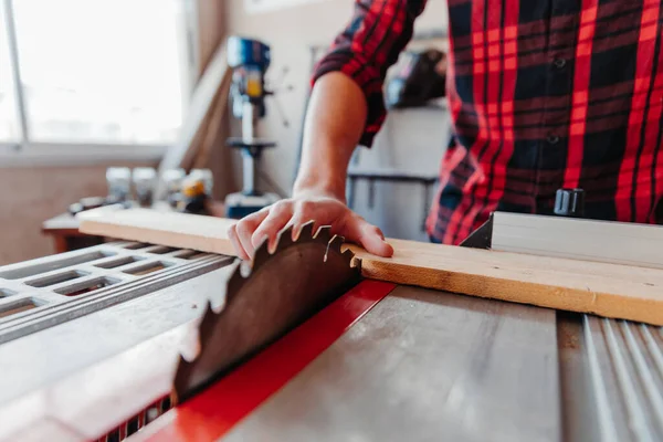 Caucasian Male Carpenter Cutting Wood While Working Workshop — Stock Photo, Image