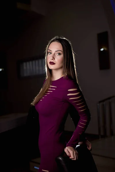 Closeup Shot Young Female Purple Dress Looking Camera Dark Room — Foto Stock