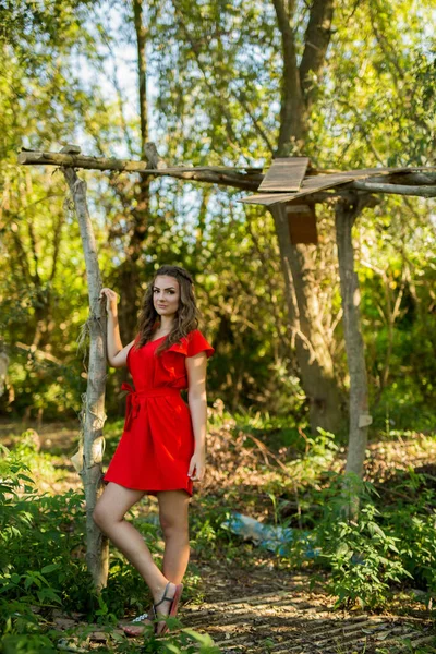 Shallow Focus Shot Young Woman Standing Wooden Tent Red Dress — Stockfoto