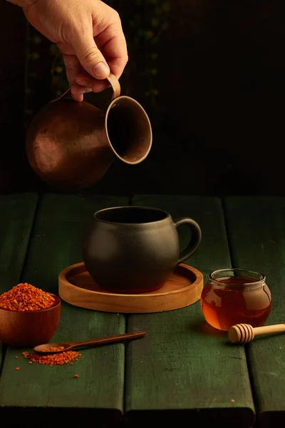 Vertical Shot Hand Pouring Something Mug Honey Jar — Stock Photo, Image