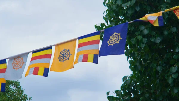 Low Angle Shot Buddhist Dharmachakra Flags Hanging Blue Clear Sky — Stock Photo, Image