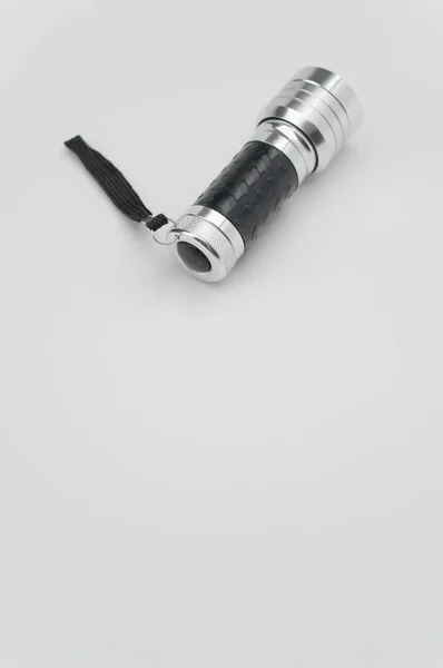 Vertical Shot Small Black Silver Flashlight Isolated White Background — Stock Photo, Image