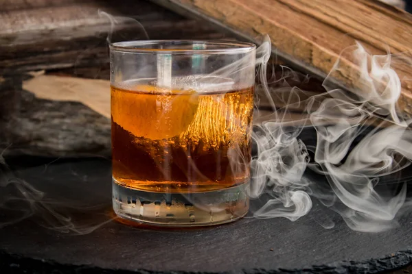 Closeup Glass Whiskey Ice Black Slate Smoky Background — Stock Photo, Image