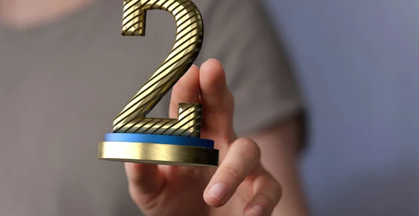 A person\'s hand reaching to 3D rendered Second Place Prize