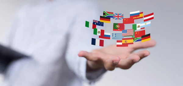 Homem Segurando Bandeiras Nacionais Virtuais Diferentes Países Estrangeiros — Fotografia de Stock