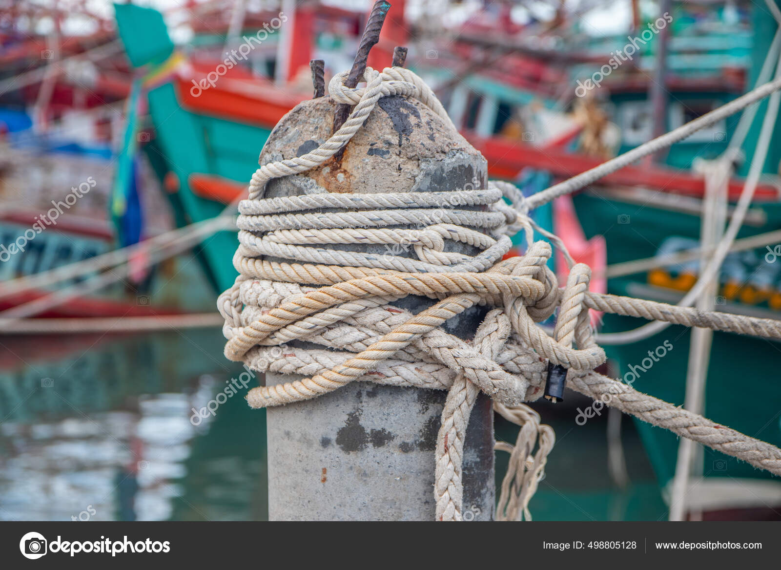 Rope Bollard Jetty Rope Tied Pole Wooden Dock Boat Rope Stock Photo by  ©Wirestock 498805128