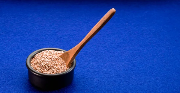 Closeup Shot Bowl Quinoa Blue Background — Stock Photo, Image