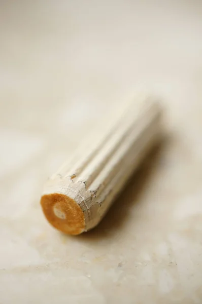 Vertical Closeup Shot Wooden Pin Marble Surface — Stock Photo, Image