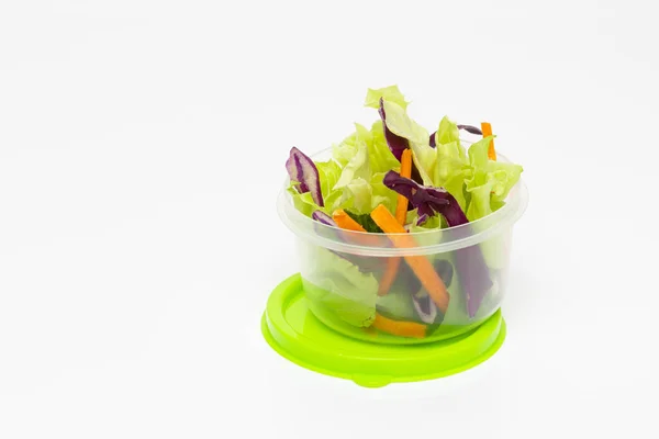 Closeup Small Plastic Bowl Salad White Background — Stock Photo, Image