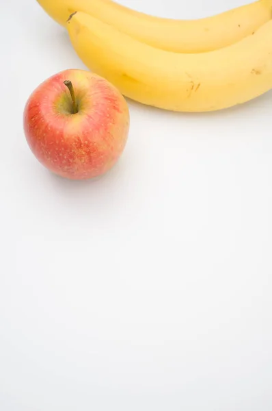 Frutta Fresca Sana Una Superficie Bianca Mela Banana — Foto Stock