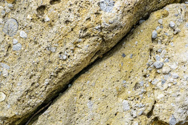 Een Close Van Natuurlijk Getextureerde Stenen Oppervlak — Stockfoto