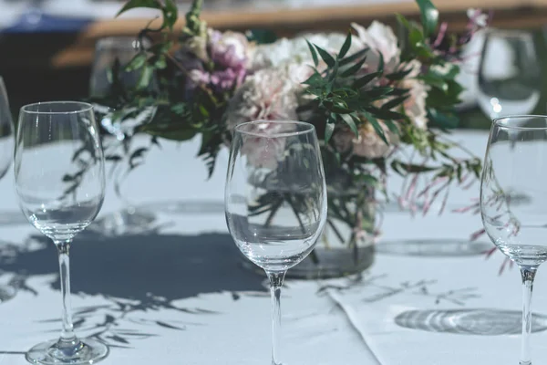 Closeup Shot Wedding Flower Centerpiece Wine Glasses Stock Photo