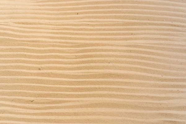 Teksturowany Żółty Piasek Plaży — Zdjęcie stockowe