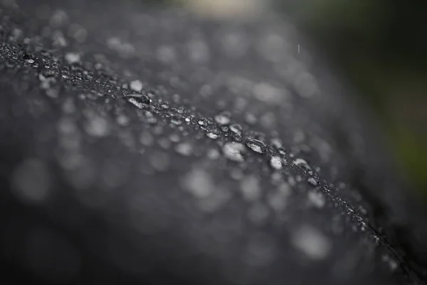 Closeup Shot Water Drops Black Surface — Stock Photo, Image