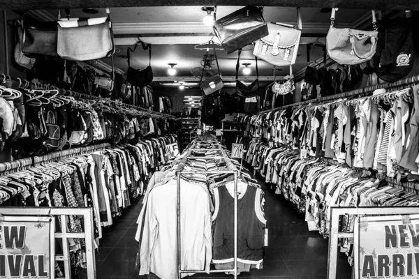 A grayscale shot of a thrift store in the Philippines