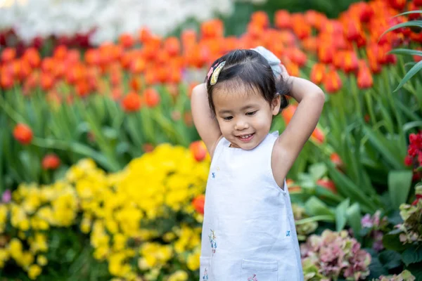 Cute Little Girl Standing Flower Garden — Stock Photo, Image