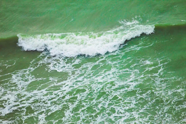 Vzdušný Pohled Zelené Vlnité Moře Slunečného Dne — Stock fotografie