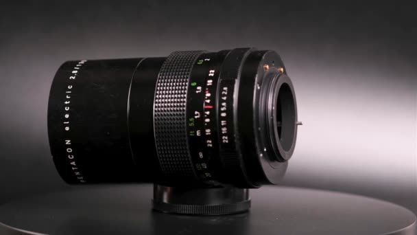 Close View Camera Lens Rotating Dark Background — Stok Video