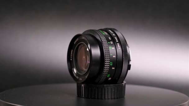 Close View Camera Lens Rotating Dark Background — Stock Video