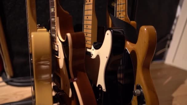 Close Footage Row Electric Guitars Studio — стоковое видео