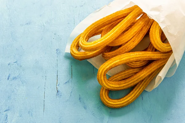 Close Shot Deep Fried Spanish Churros Isolated Blue Background — Stock Photo, Image