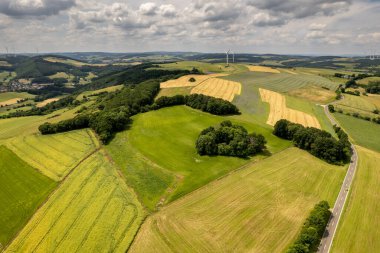 An aerial view of a landscape in Rhineland-Palatinate, Germany on the river Glan in the village Rehborn clipart