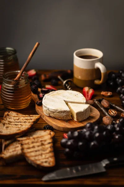 Vertical Shot Tiny White Cake Grapes Honey Coffee Wooden Table — Stock Photo, Image