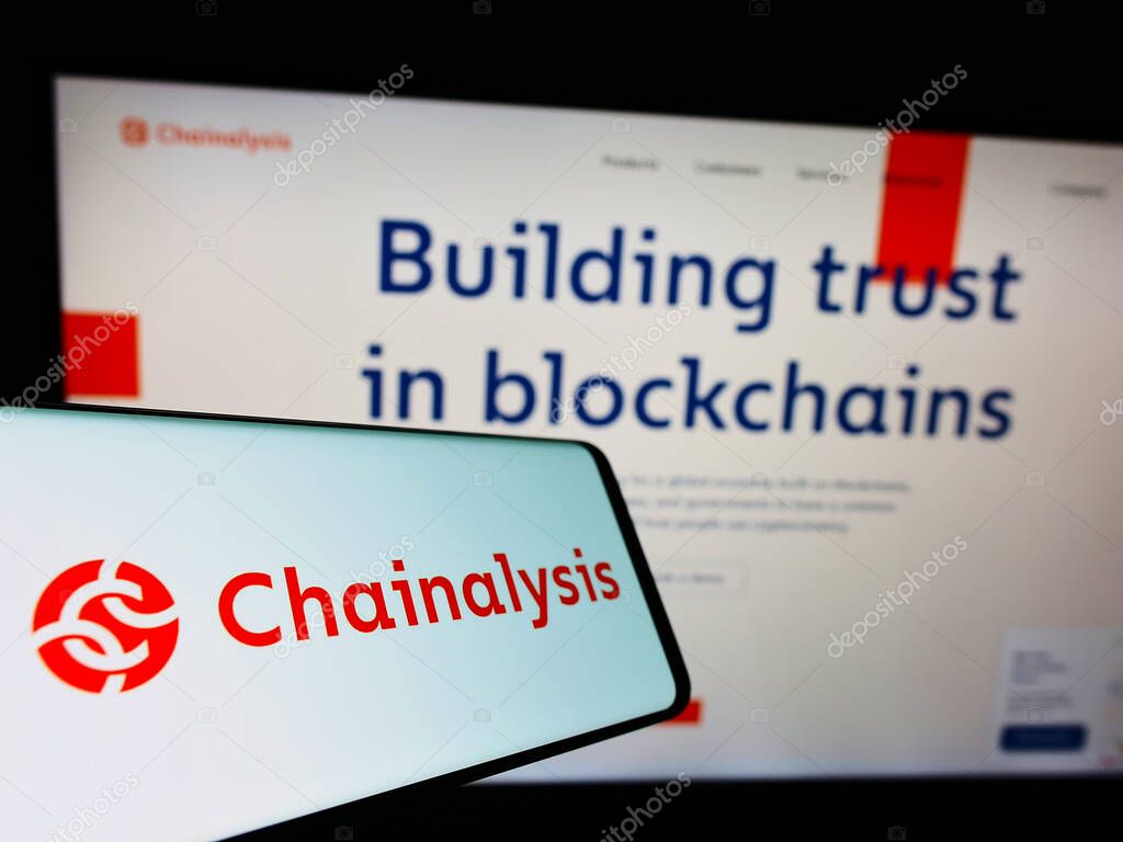 STUTTGART, GERMANY - Jun 28, 2021: Smartphone with logo of US cryptocurrency company Chainalysis Inc. on screen in front of website. Focus on center-left of phone display.