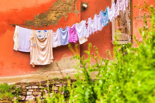 Shot Laundry Clothes Hanging Rope Dried Background Red Aged Wall — Stock Photo, Image