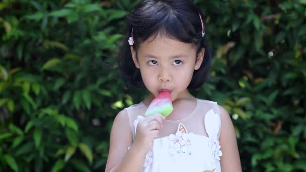 Girl Eating Cold Watermelon Ice Cream — стоковое видео