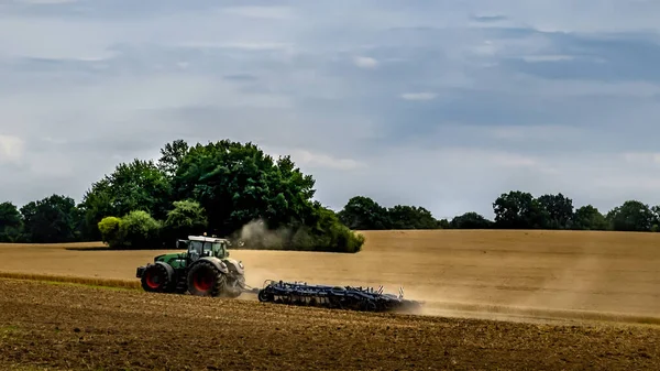 Aerial Shot Tractor Field Dark Cloudy Sky — Stock Photo, Image